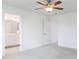 Bedroom with ceiling fan featuring en-suite bathroom with double sink vanity at 22 Twin Birch Dr, Angier, NC 27501