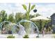 Community splash pad featuring playful water features for and families to enjoy under the summer sun at 272 Beacon Dr, Pittsboro, NC 27312