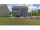 Stunning backyard featuring a patio, hot tub, and outdoor dining area perfect for entertaining at 2801 Landon Ridge Dr, New Hill, NC 27562