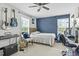 Bedroom featuring a ceiling fan, two windows, and decorated with music equipment at 2801 Landon Ridge Dr, New Hill, NC 27562