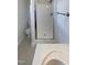 Bathroom featuring a glass enclosed shower, toilet, and vanity with a clean, minimalist design at 300 Perry St, Rolesville, NC 27571