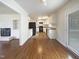 Bright kitchen with white cabinets, black appliances, and plenty of counter space at 300 Perry St, Rolesville, NC 27571