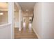 Hallway with neutral paint, luxury vinyl plank flooring, and great natural light at 316 Hopewell Branch Ct, Smithfield, NC 27577