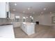 Open kitchen featuring white cabinets, stainless appliances, and center island at 316 Hopewell Branch Ct, Smithfield, NC 27577