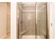 Bathroom shower with a bench and decorative tile at 316 Hopewell Branch Ct, Smithfield, NC 27577