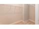 Spacious walk-in closet featuring wire shelving for efficient storage in a new home at 316 Hopewell Branch Ct, Smithfield, NC 27577