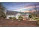 Beautiful backyard with a well-maintained lawn and charming patio at 321 Nottingham Dr, Chapel Hill, NC 27517