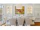 Elegant dining room featuring stylish decor, a modern chandelier, and ample seating for formal gatherings at 321 Nottingham Dr, Chapel Hill, NC 27517