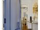 Foyer with a view into the dining room, hardwood floors, and elegant decor at 321 Nottingham Dr, Chapel Hill, NC 27517