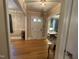 Inviting foyer with beautiful wood floors leading into a spacious living area at 321 Willowood Dr, Henderson, NC 27536