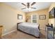 Comfortable bedroom featuring soft lighting, ceiling fan, and a calming atmosphere that promotes relaxation and restful sleep at 35 Wickersham Way, Louisburg, NC 27549