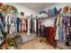 Spacious walk-in closet with ample storage, shelving, and hanging space, ideal for organizing wardrobes and accessories at 35 Wickersham Way, Louisburg, NC 27549