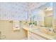 Classic bathroom features tiled walls, a large mirror, and a sink with vanity at 3613 Hope Valley Rd, Durham, NC 27707