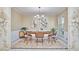Elegant dining room with a modern chandelier, artistic decor, and a classic style creating a refined space at 3613 Hope Valley Rd, Durham, NC 27707