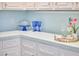 Charming kitchen counter with cake stand, glassware, and a wine bottle for a festive look at 3613 Hope Valley Rd, Durham, NC 27707