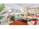 Comfortable living room with modern green sofa, stylish decor, and warm accents for an inviting atmosphere at 3613 Hope Valley Rd, Durham, NC 27707