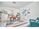 Bright office with a wooden desk, a laptop, modern decor, and comfortable seating at 3613 Hope Valley Rd, Durham, NC 27707