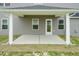 Back patio features a concrete floor and a partial roof at 410 Hopewell Branch Ct, Smithfield, NC 27577