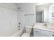 Bathroom featuring a shower, vanity, and tile at 410 Hopewell Branch Ct, Smithfield, NC 27577