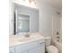 Bathroom with a marble countertop, vanity, and shower at 410 Hopewell Branch Ct, Smithfield, NC 27577