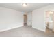 Bedroom with view into adjacent bathroom at 410 Hopewell Branch Ct, Smithfield, NC 27577