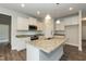Charming kitchen with granite countertops, a center island, and ample cabinet space at 410 Hopewell Branch Ct, Smithfield, NC 27577