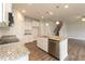 Stylish kitchen featuring an island with granite countertops and stainless steel appliances at 410 Hopewell Branch Ct, Smithfield, NC 27577