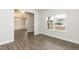 Bright, inviting living space with hardwood floors, large windows, and an open doorway at 410 Hopewell Branch Ct, Smithfield, NC 27577