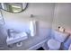 Modern bathroom features a sleek sink, toilet, and stylish round mirror at 508 S Swain St, Raleigh, NC 27601