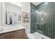 This bathroom features a glass walk in shower and wood vanity at 556 Contempo Dr # 22, Rolesville, NC 27571