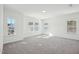 Bedroom features large windows, lots of natural light, and carpet at 556 Contempo Dr # 22, Rolesville, NC 27571