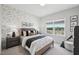 Cozy bedroom with dinosaur wallpaper and a view of the neighborhood at 556 Contempo Dr # 22, Rolesville, NC 27571