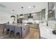 Well-appointed kitchen featuring a central island, bar seating, stainless steel appliances, and plenty of counter space at 556 Contempo Dr # 22, Rolesville, NC 27571