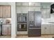 This kitchen boasts modern stainless appliances, double oven, and gray cabinets at 556 Contempo Dr # 22, Rolesville, NC 27571