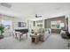 Spacious living room featuring a ceiling fan, neutral color palette, and lots of natural light at 556 Contempo Dr # 22, Rolesville, NC 27571