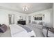 Stately main bedroom boasts crown molding, recessed lighting, and a sitting area at 556 Contempo Dr # 22, Rolesville, NC 27571