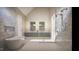 Spacious bathroom with a luxurious soaking tub, walk-in glass shower and dual vanity sinks at 5808 Norwood Ridge Dr, Raleigh, NC 27614