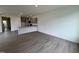 Well-designed kitchen with granite countertops and stainless appliances integrates seamlessly into the spacious living area, perfect for entertaining at 6401 Granite Quarry Dr, Raleigh, NC 27610