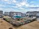 Aerial view of community garden, showcasing raised beds and gathering spaces at 6609 Truxton Ln, Raleigh, NC 27616