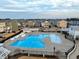 An aerial view of the community pool and surrounding buildings and homes at 6609 Truxton Ln, Raleigh, NC 27616