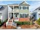 Charming two-story home with a brick foundation and welcoming double porches at 6609 Truxton Ln, Raleigh, NC 27616