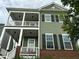 Charming home with double porches, brick accents, and ample natural light at 6609 Truxton Ln, Raleigh, NC 27616