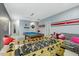 Stylish game room with a foosball table, pool table, and modern decor for entertaining at 6609 Truxton Ln, Raleigh, NC 27616