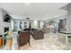 Open floor plan featuring a spacious living room and kitchen with modern appliances at 6609 Truxton Ln, Raleigh, NC 27616