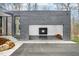 Spacious garage featuring an open layout, black cabinets, and a kayak at 721 Jones Ferry Rd, Chapel Hill, NC 27516