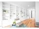 Inviting living room with custom built-in bookshelves, comfortable seating, and hardwood floors at 721 Jones Ferry Rd, Chapel Hill, NC 27516
