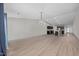Open-concept living space with wood-look floors, recessed lighting, and combined living and dining areas at 818 Houston Ct, Haw River, NC 27258
