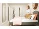 Stylized bedroom featuring two beds and ensuite bathroom through an open door at 868 Pilot St # 2, Haw River, NC 27258