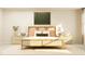 Inviting bedroom featuring a stylish bed, decorative pillows and neutral decor at 874 Pilot St # 5, Haw River, NC 27258