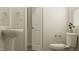Classic powder room with pedestal sink, and fresh decor at 883 Pilot St # 48, Haw River, NC 27258
